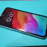 An iPhone with a damaged display